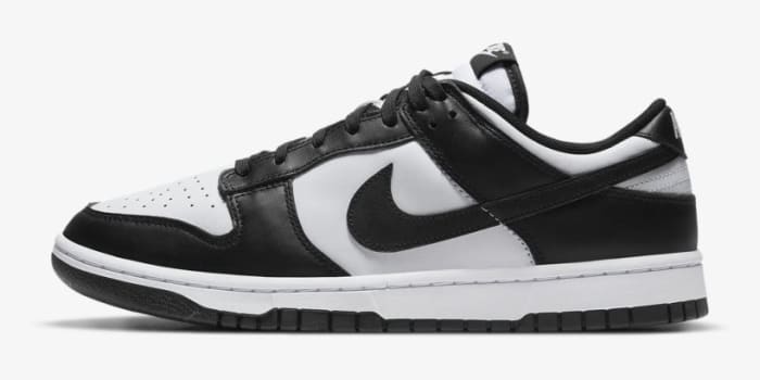 Side view of a black and white Nike Dunk sneaker.